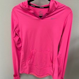 Bright pink women’s Nike running top